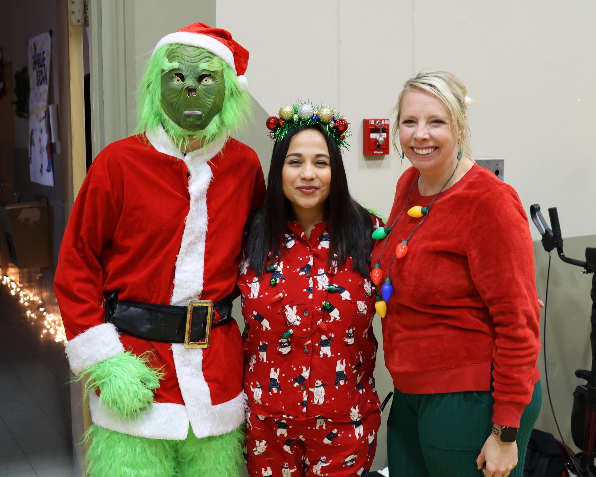 students and staff posing at the winter wishes rally