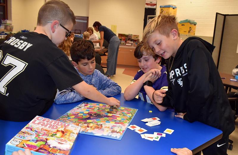 Students playing Candy Land