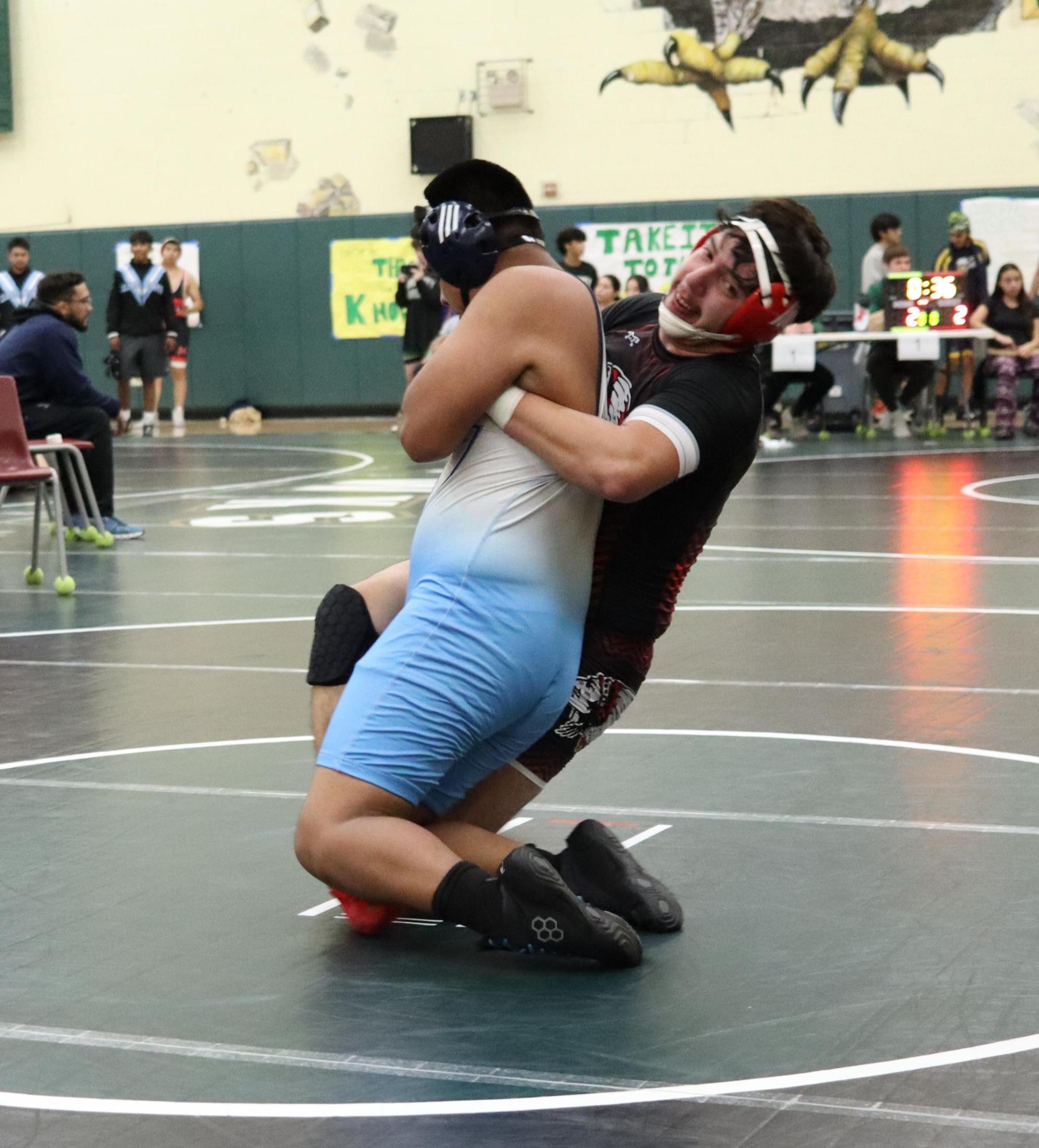 wrestlers in action at the Hawks invitational