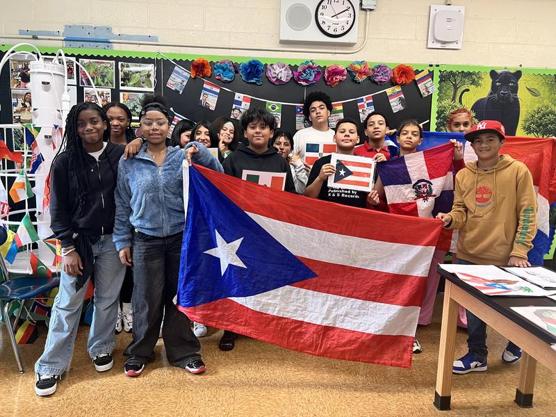 Middle School Students with a Puerto Rican flag