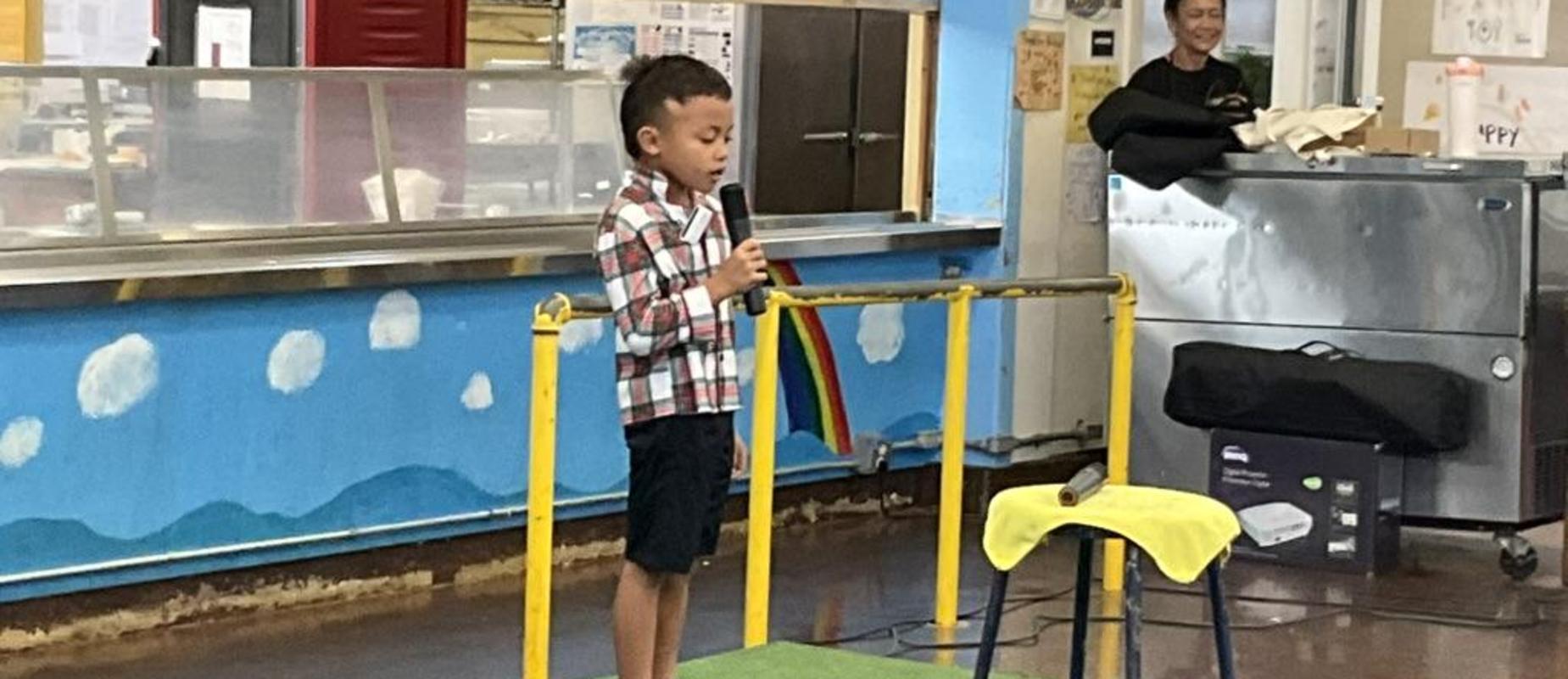 Student singing at the Talent Show