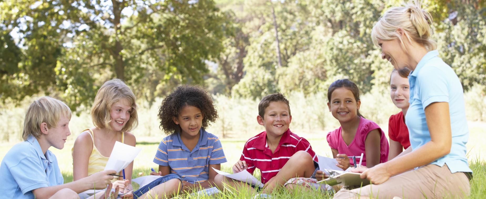 Kids outside reading
