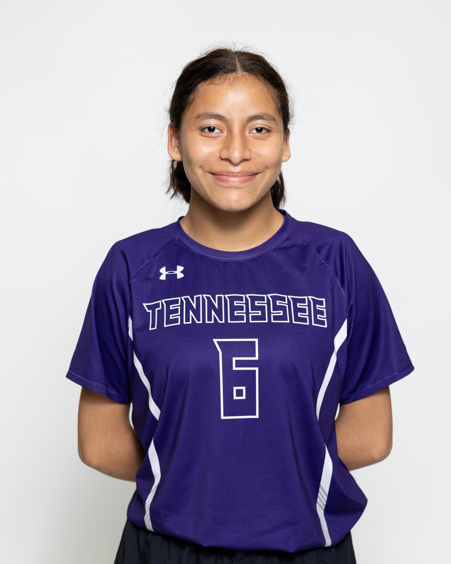 number 7 female volleyball player posing 