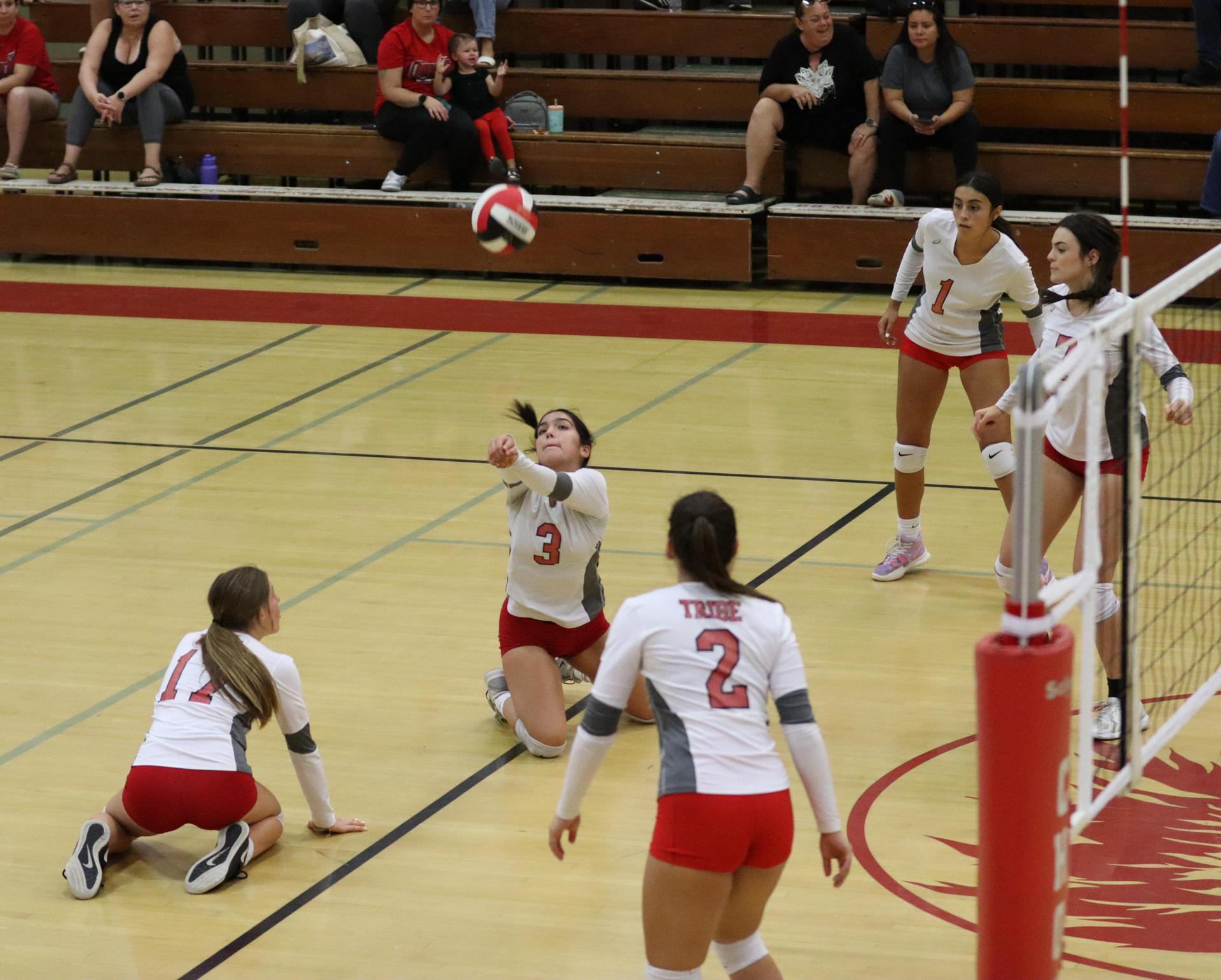 junior varsity girls playing volleyball against Liberty