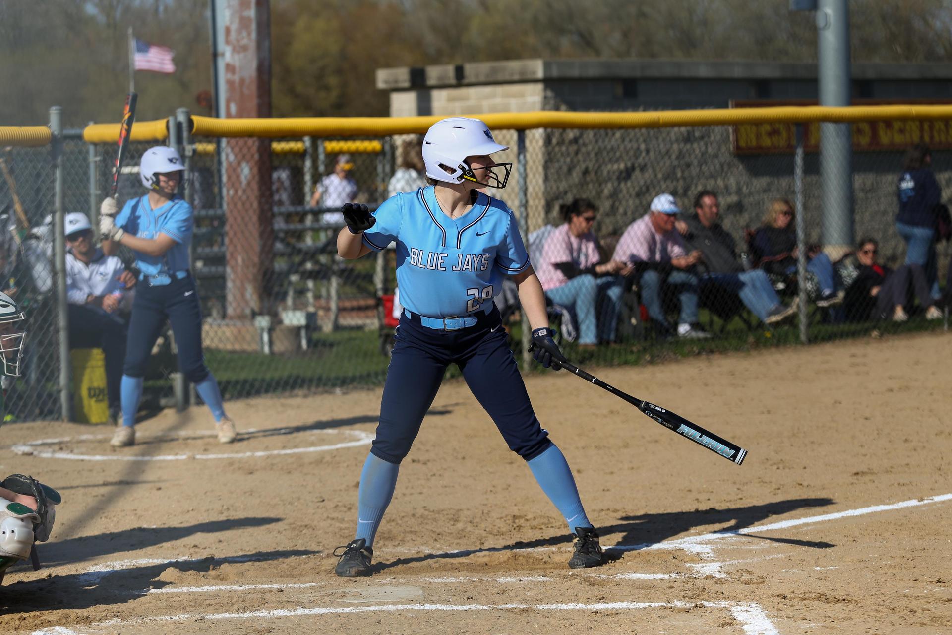 Blue Jays player holding her bat