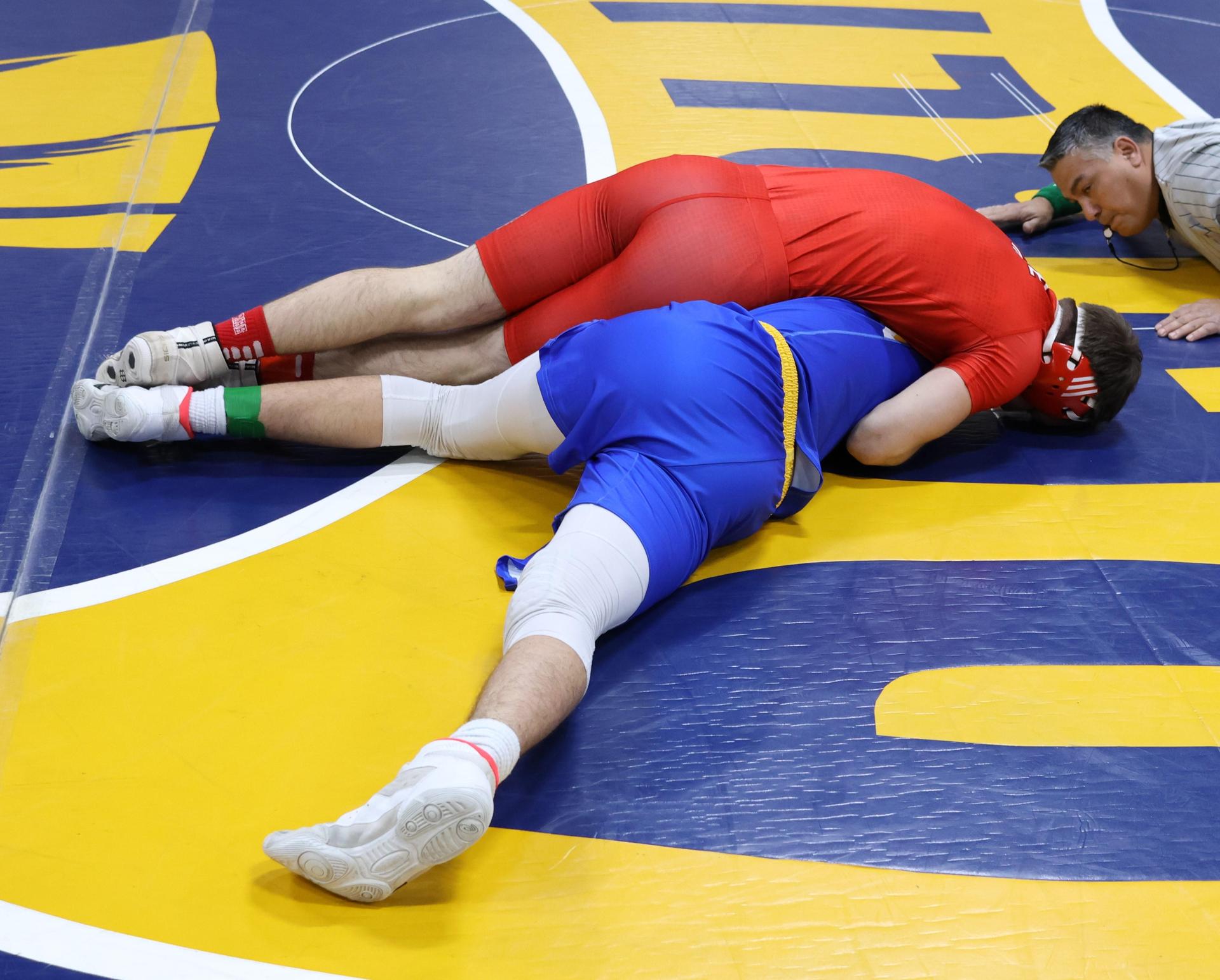 wrestlers in action at parlier