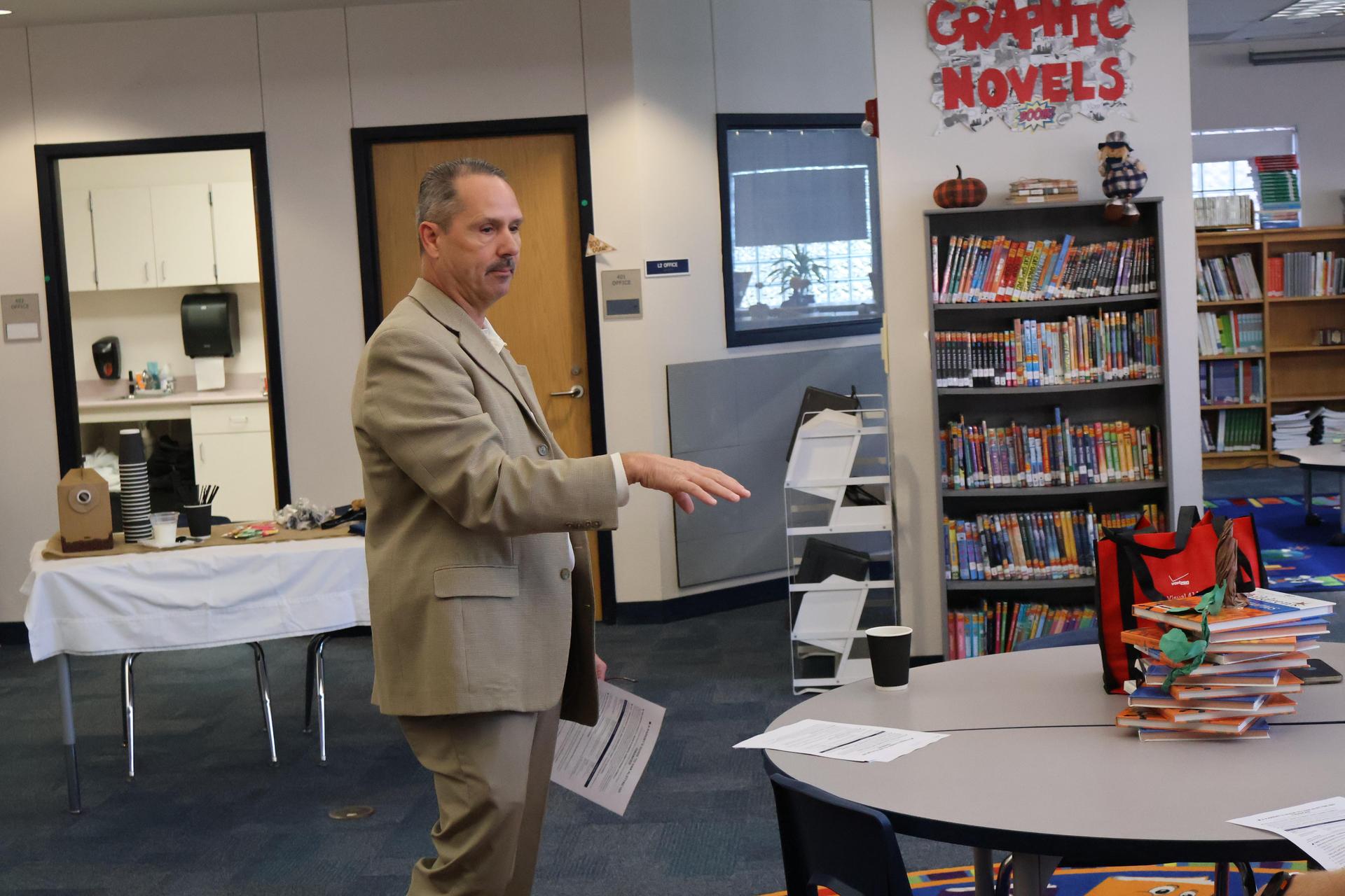 Dr. Brown addressing the crowd at Partin Elementary during the October Coffee & Conversation meetup.