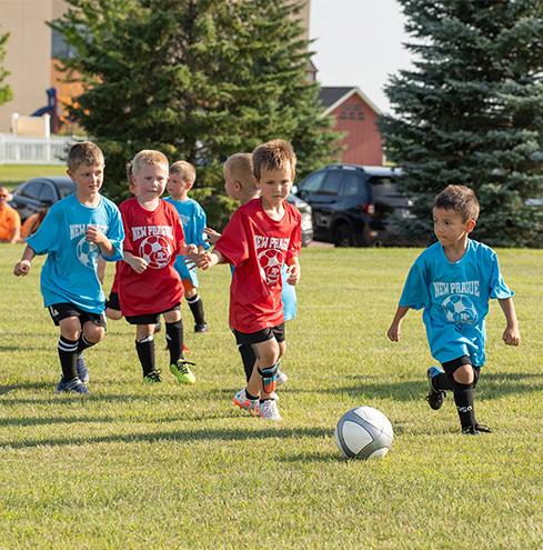 Summer youth soccer players