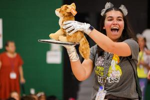 Image of teacher at pack celebration.