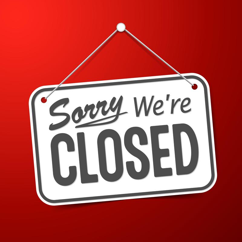Sorry We're Closed on white sign on red background