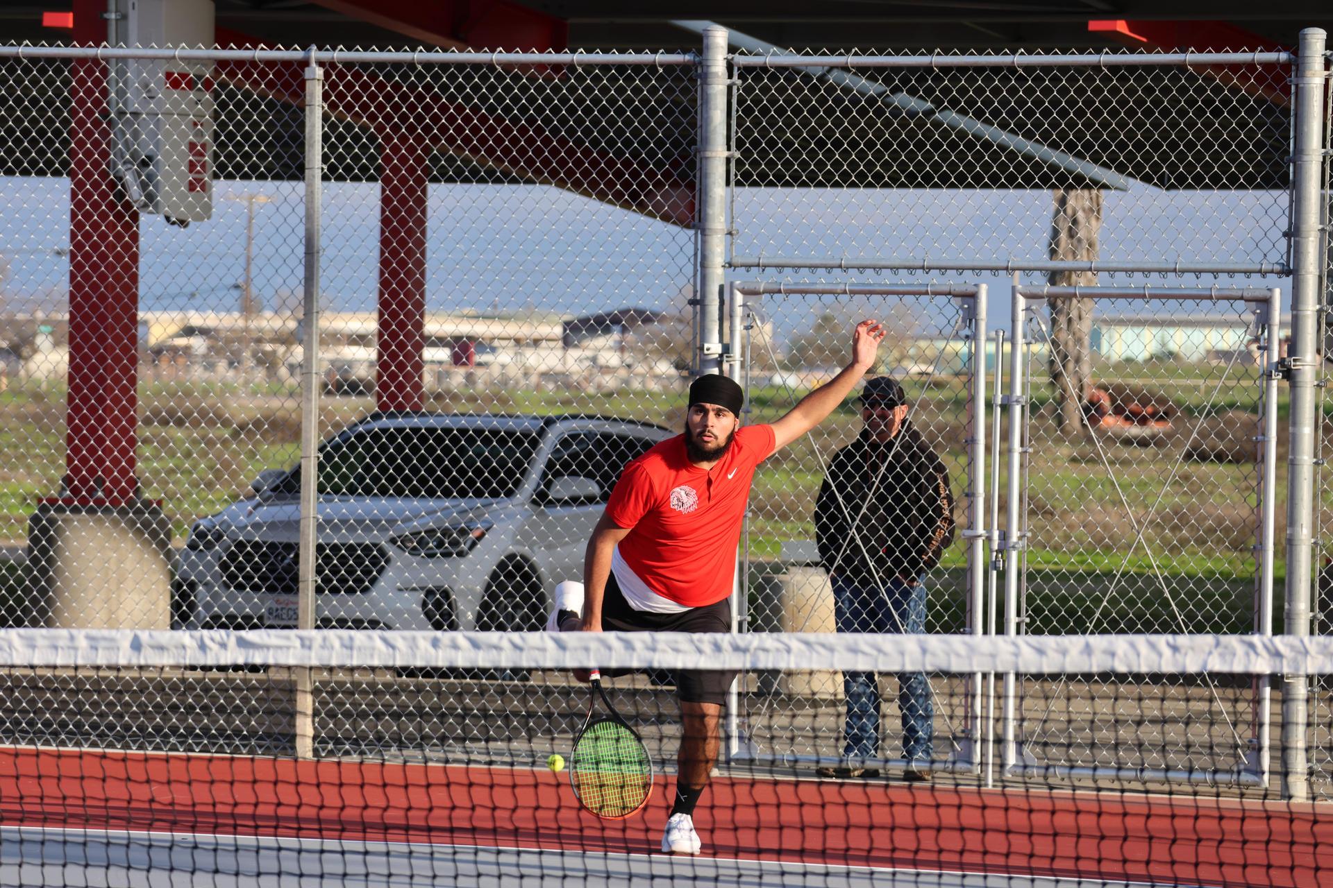 CUHS Boys playing tennis against coalinga