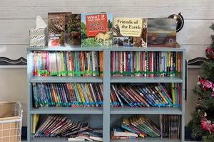 The new books now fill the bookshelves of Jasiewicz’s classroom library