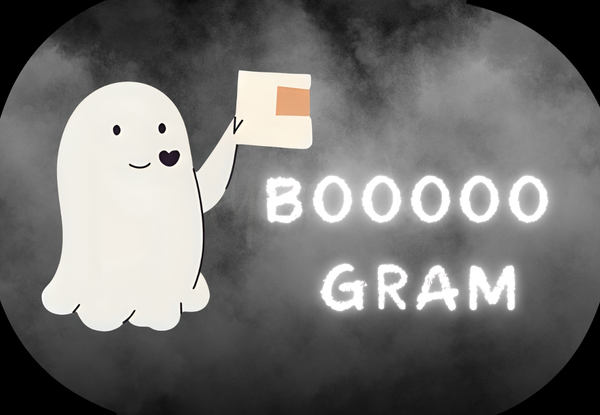 a ghost holding a sign with text boo grams