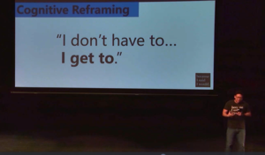 Alex Sheen talks with students at Thornapple Kellogg High School.