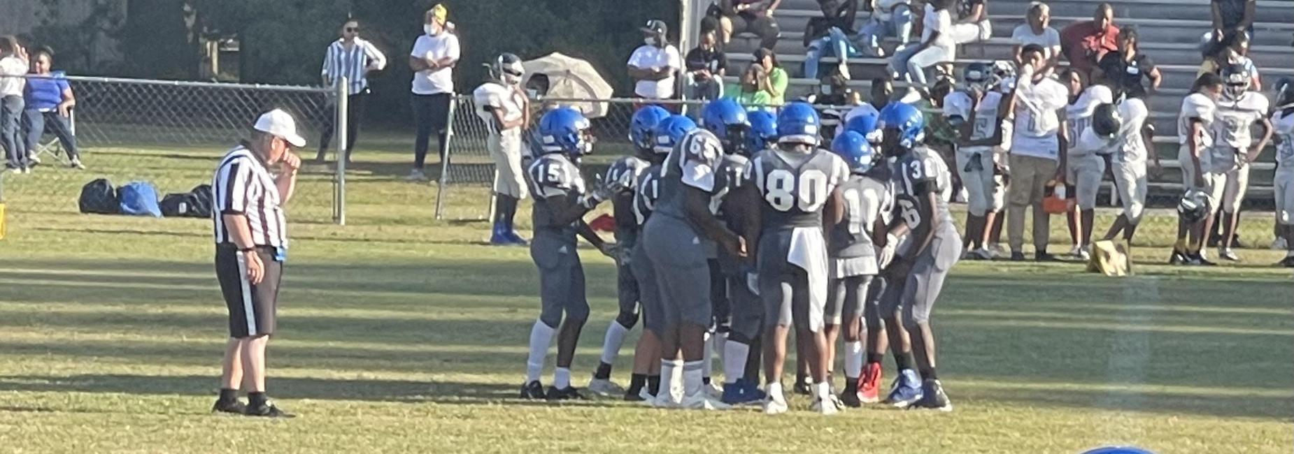 Trojans huddle