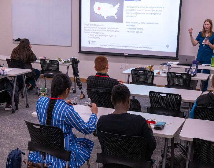 Students in classroom listening to lecture
