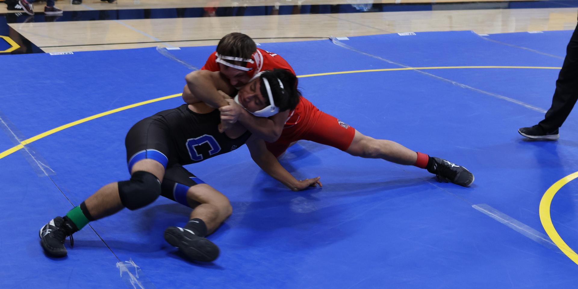 wrestlers in action at parlier