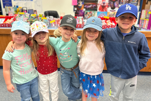 Legacy students wearing hats for a donation dress up day