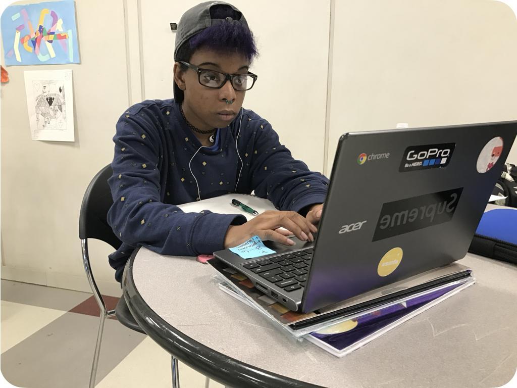 Student with Chromebook