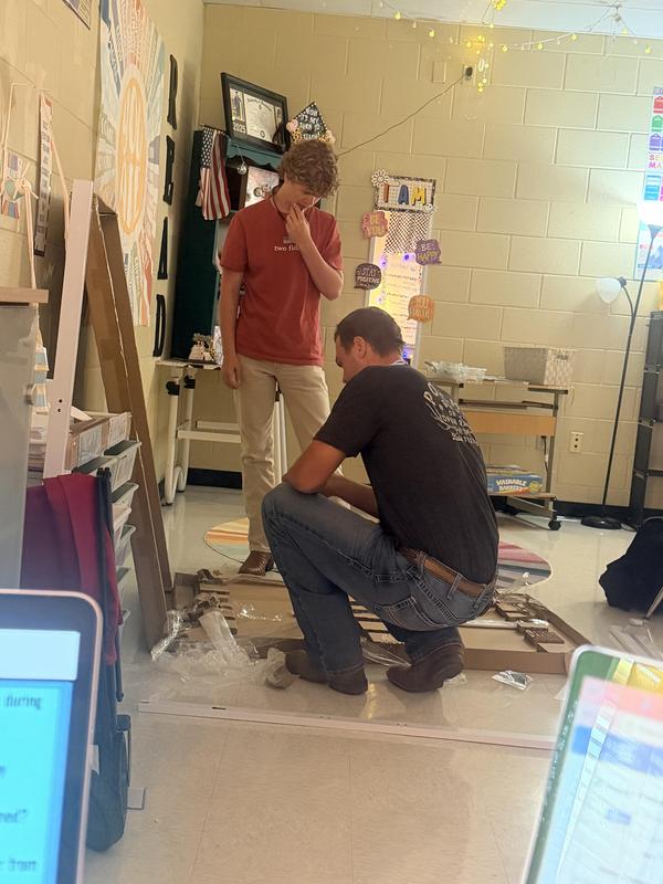 Carson and Vance laying out the pieces.