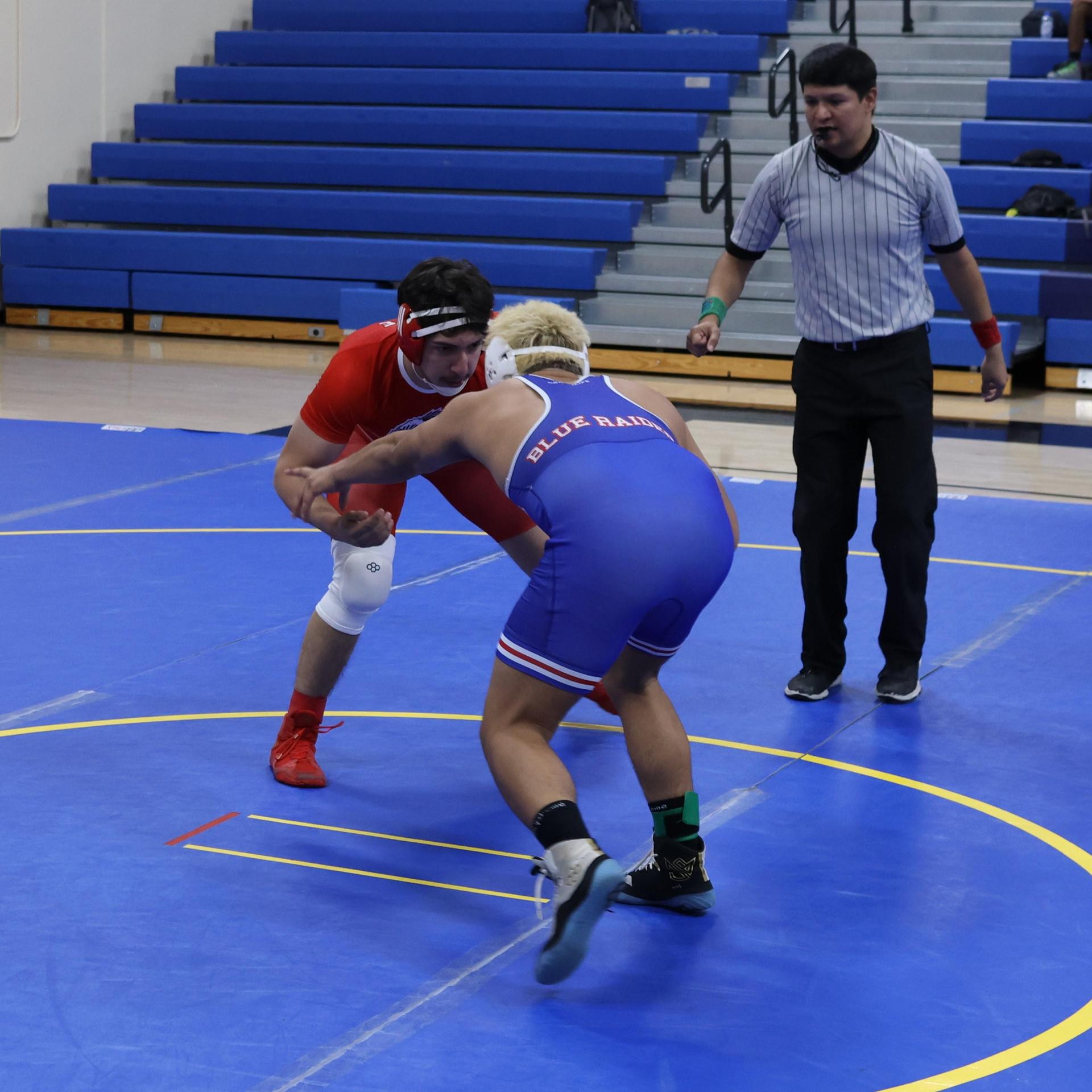 wrestlers in action at parlier