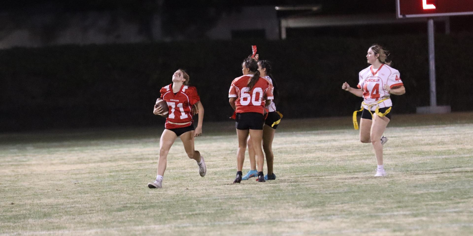 girls playing flag football