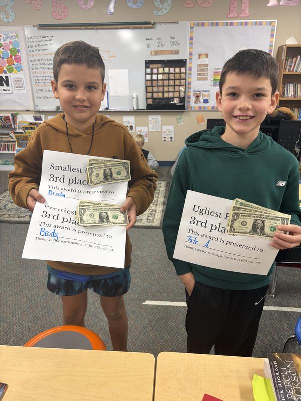 Students showing off their awards.