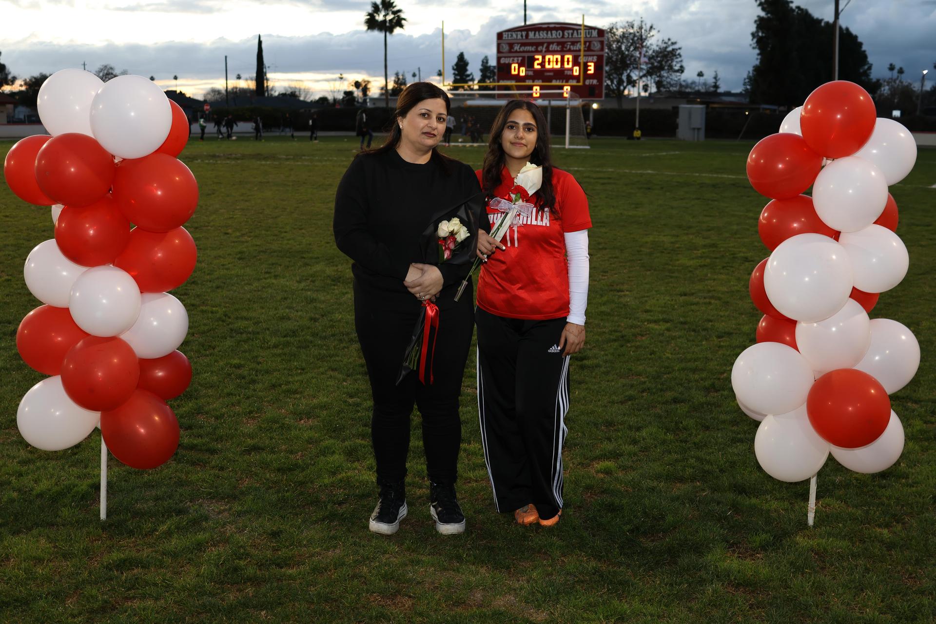 seniors posing with their escorts