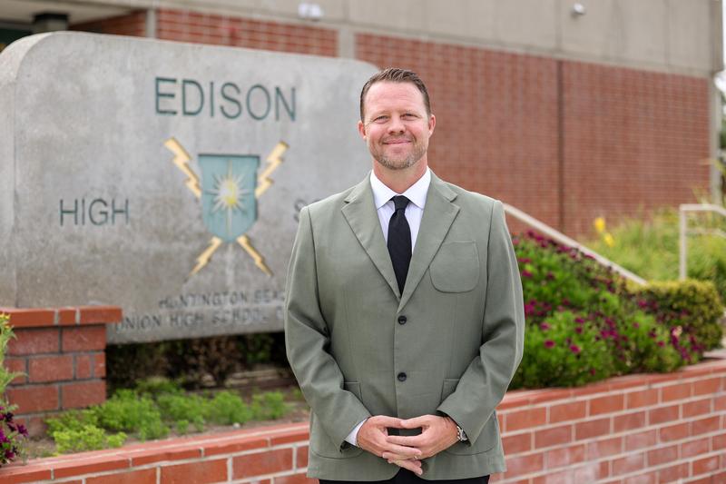 photo of Matt White in front of Edison High School