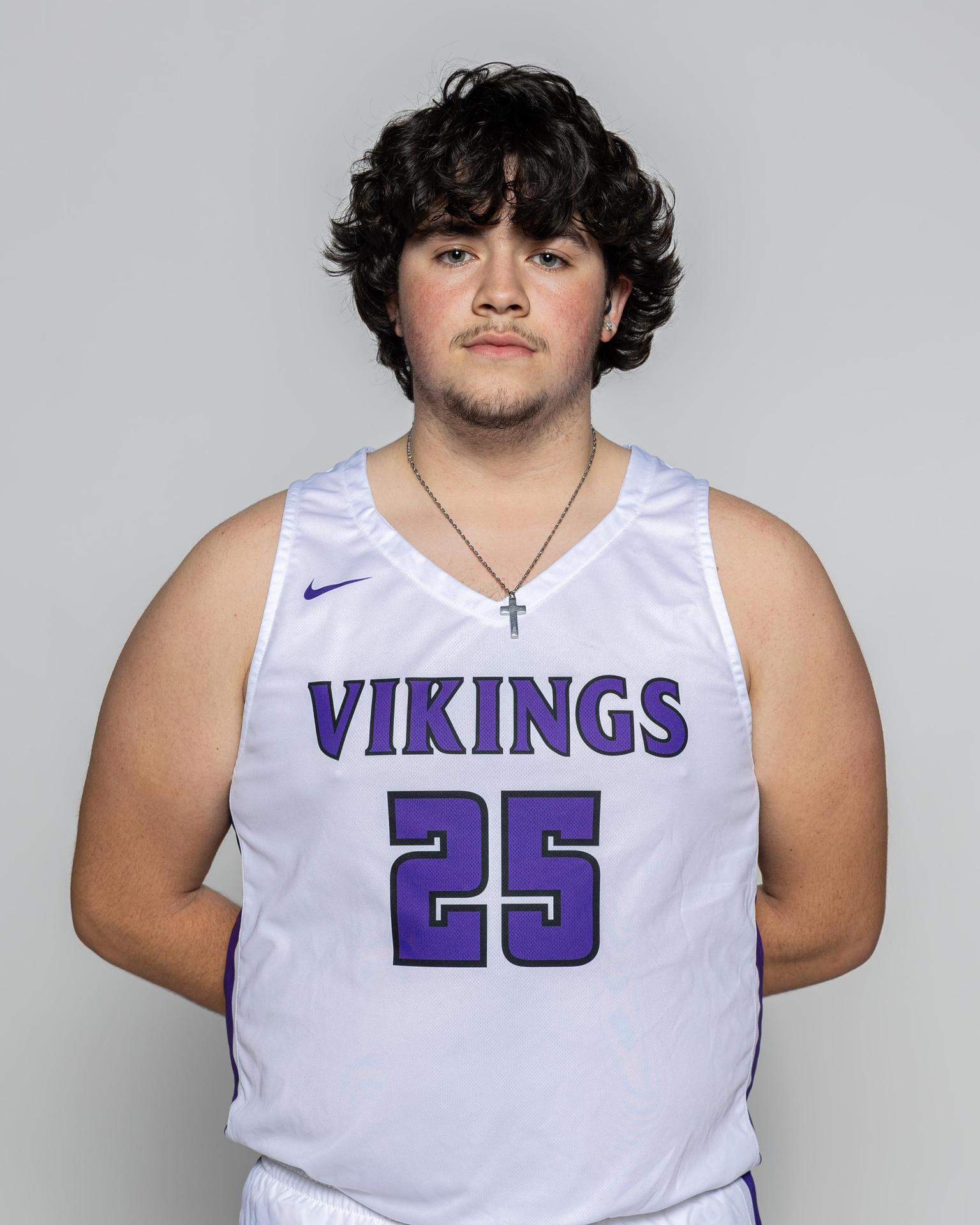 Male player number 25 posting for the roster