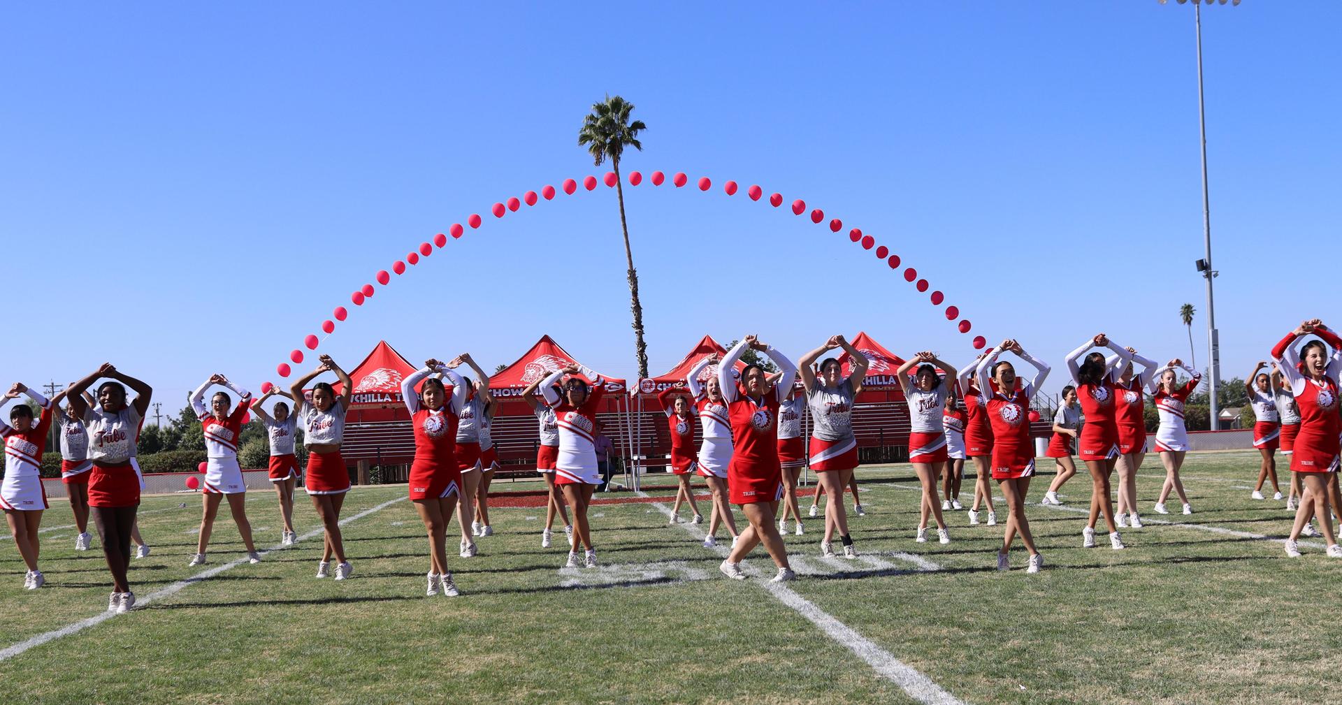 students and staff at the homecoming rally