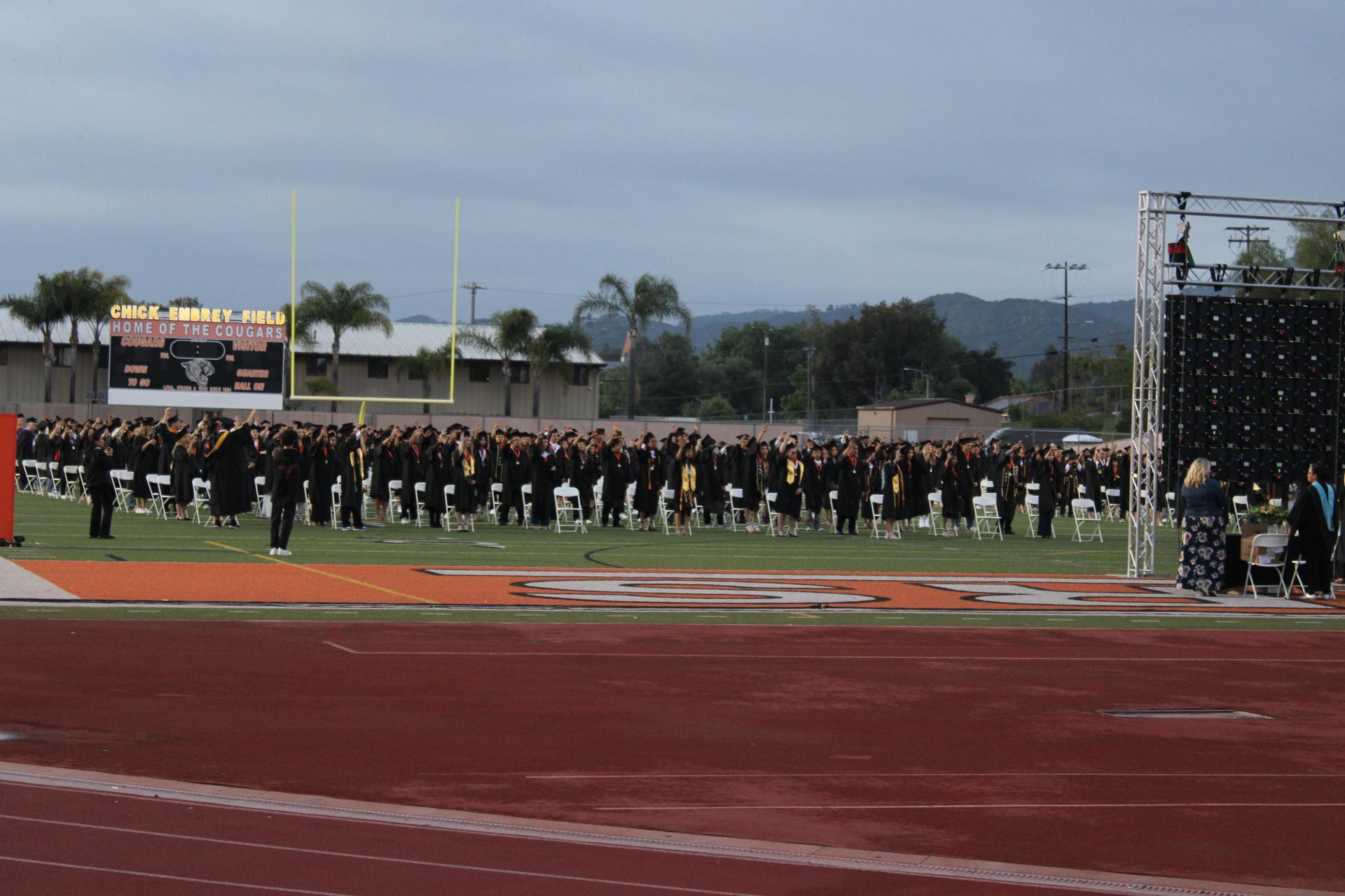 EHS graduates standing