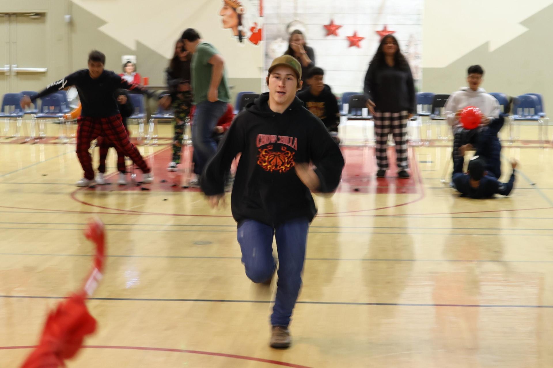students playing the balloon pop game