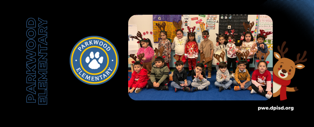 Group of children in festive attire posing together for a holiday event.