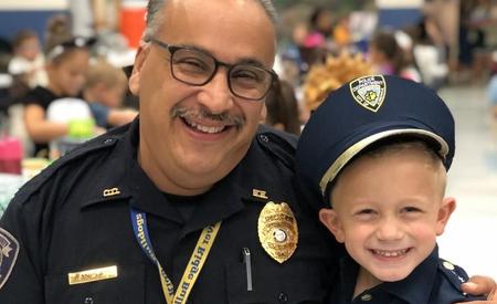 man and student smiling