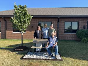 A bench was dedicated in memory of Mary Gill, who served on the Board of Education for 27 years, 24 of those as board secretary.