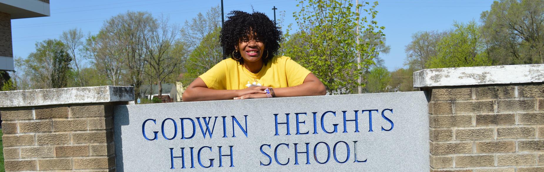 student by godwin sign