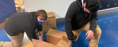 Students working on Christmas door decorations