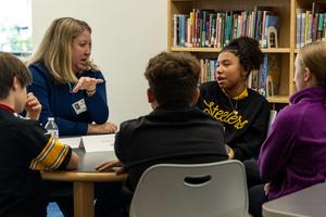Students speak with a US Steel rep