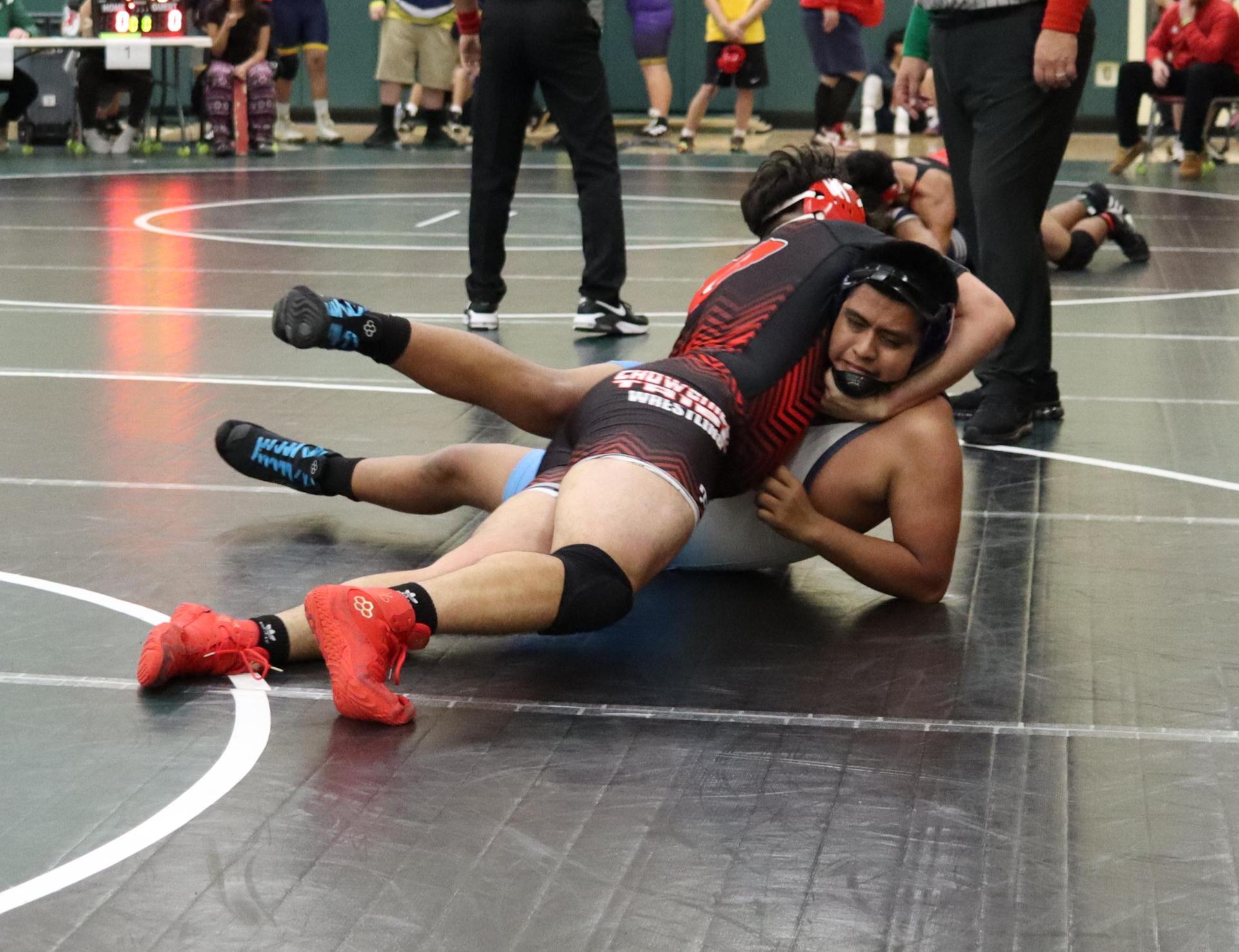 wrestlers in action at the Hawks invitational