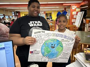 Students creating their Earth Day Posters
