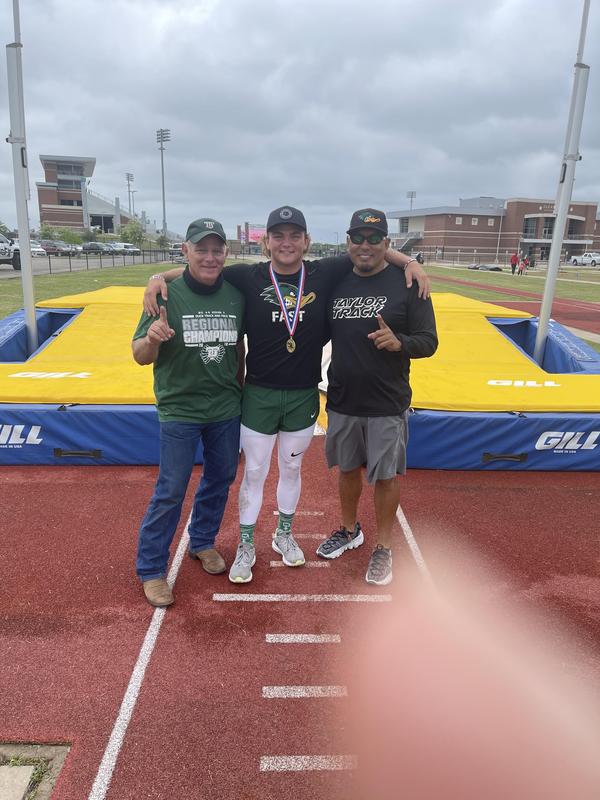 Track champ and coaches.