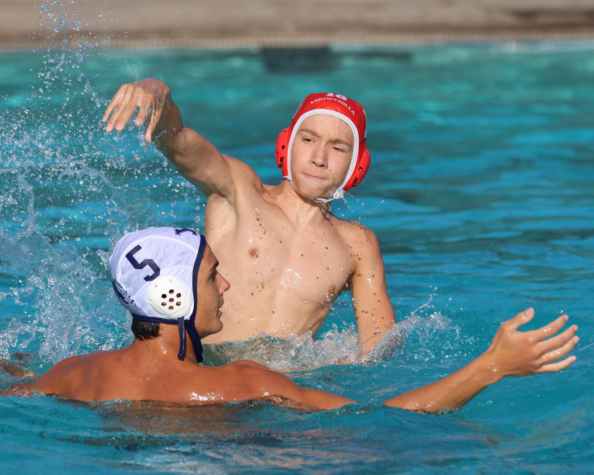 Boys playing water polo against Yosemite