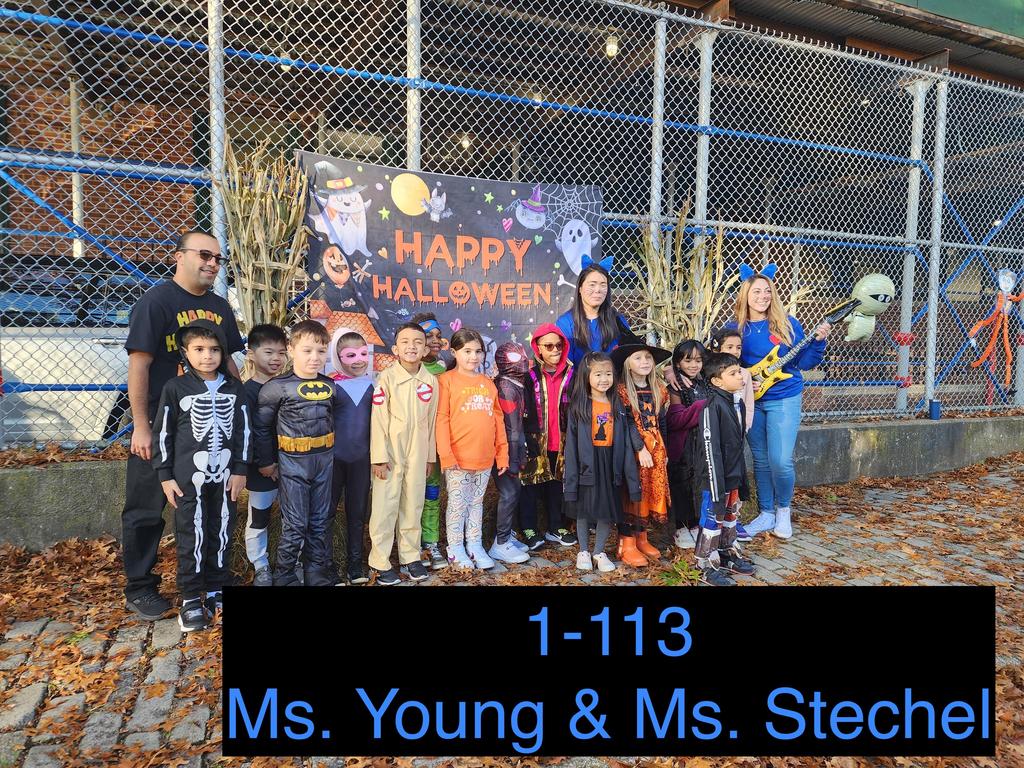 staff and students in halloween costumes