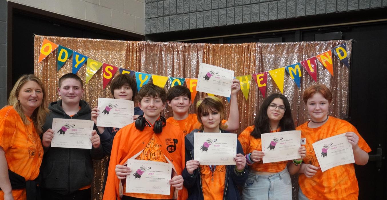 TKMS Odyssey of the Mind team members receive the OMER award.