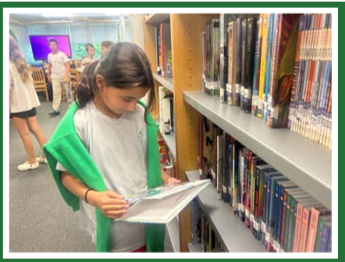 Student enjoying a book in the Lawn Library