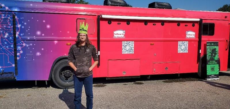 McBee student poses outside of SCETV's Pink Bus