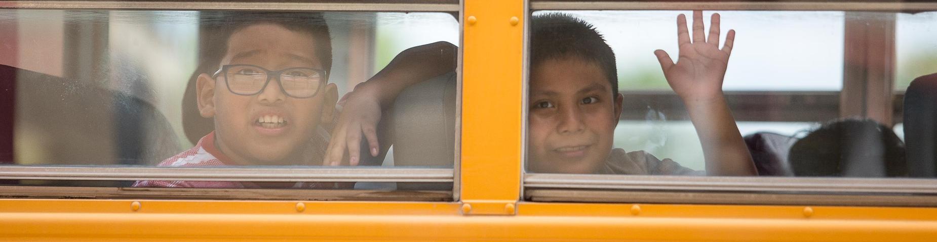 Students on bus leaving MES.
