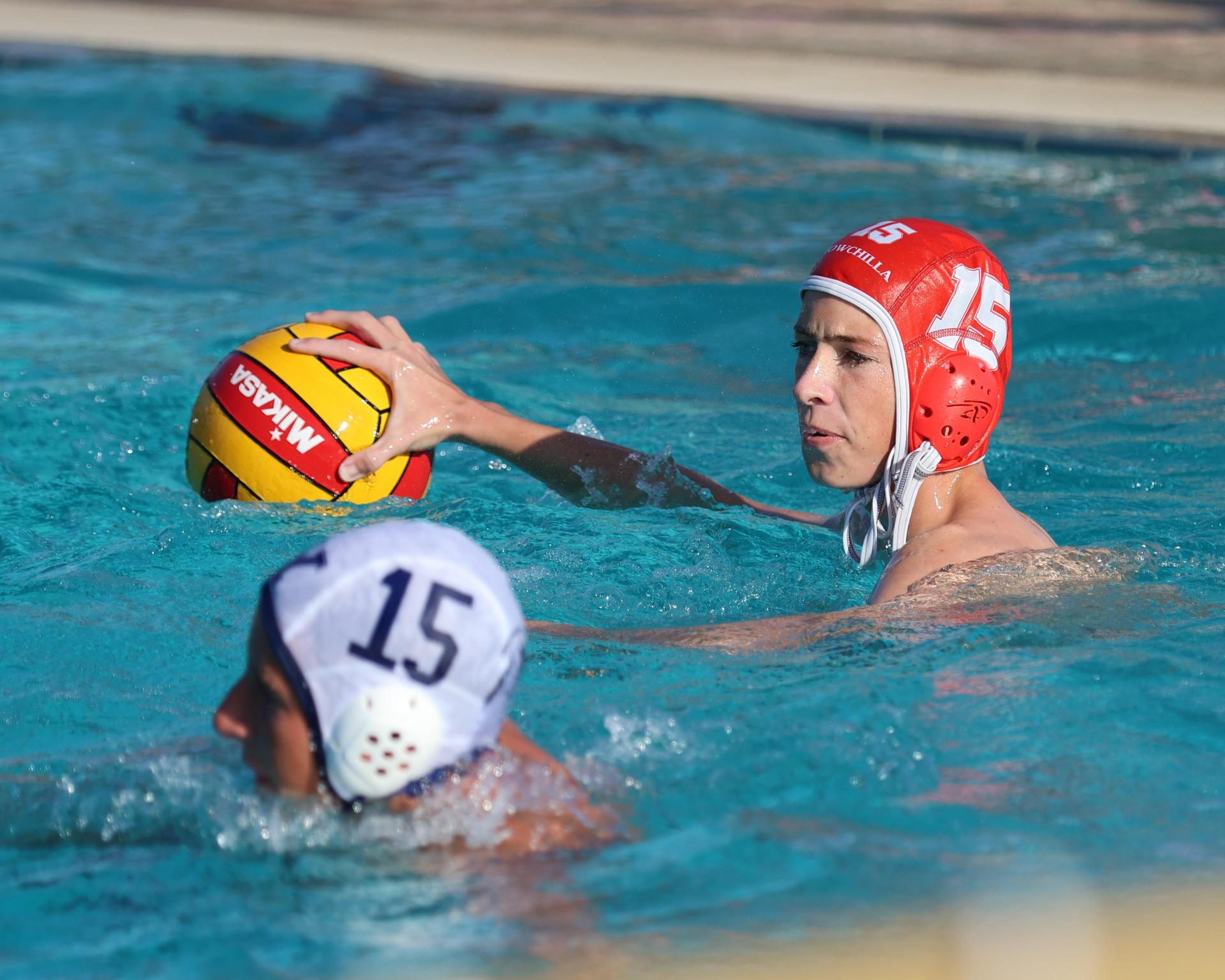 Boys playing water polo against Yosemite
