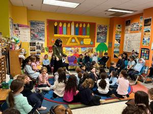 The third grade girls daven with the kidnergarten